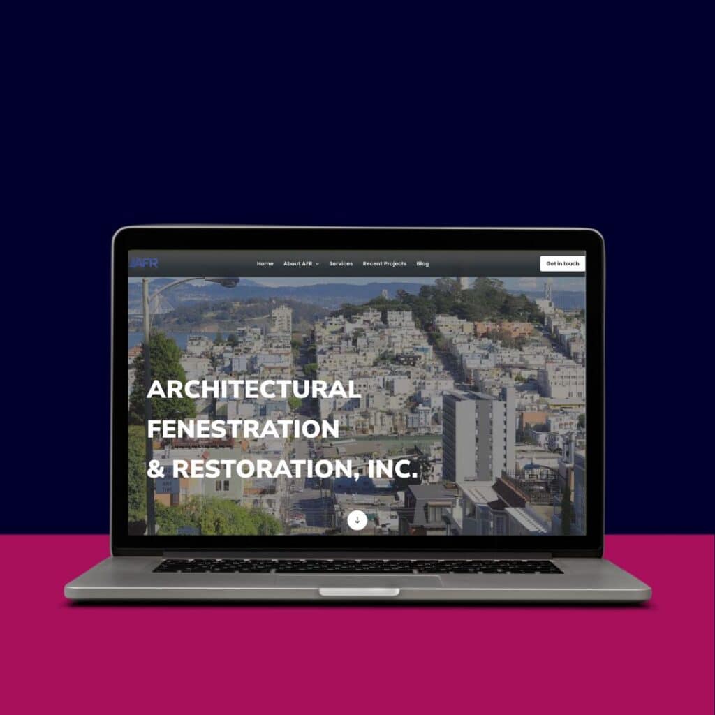 Laptop displaying architectural fenestration and restoration website.